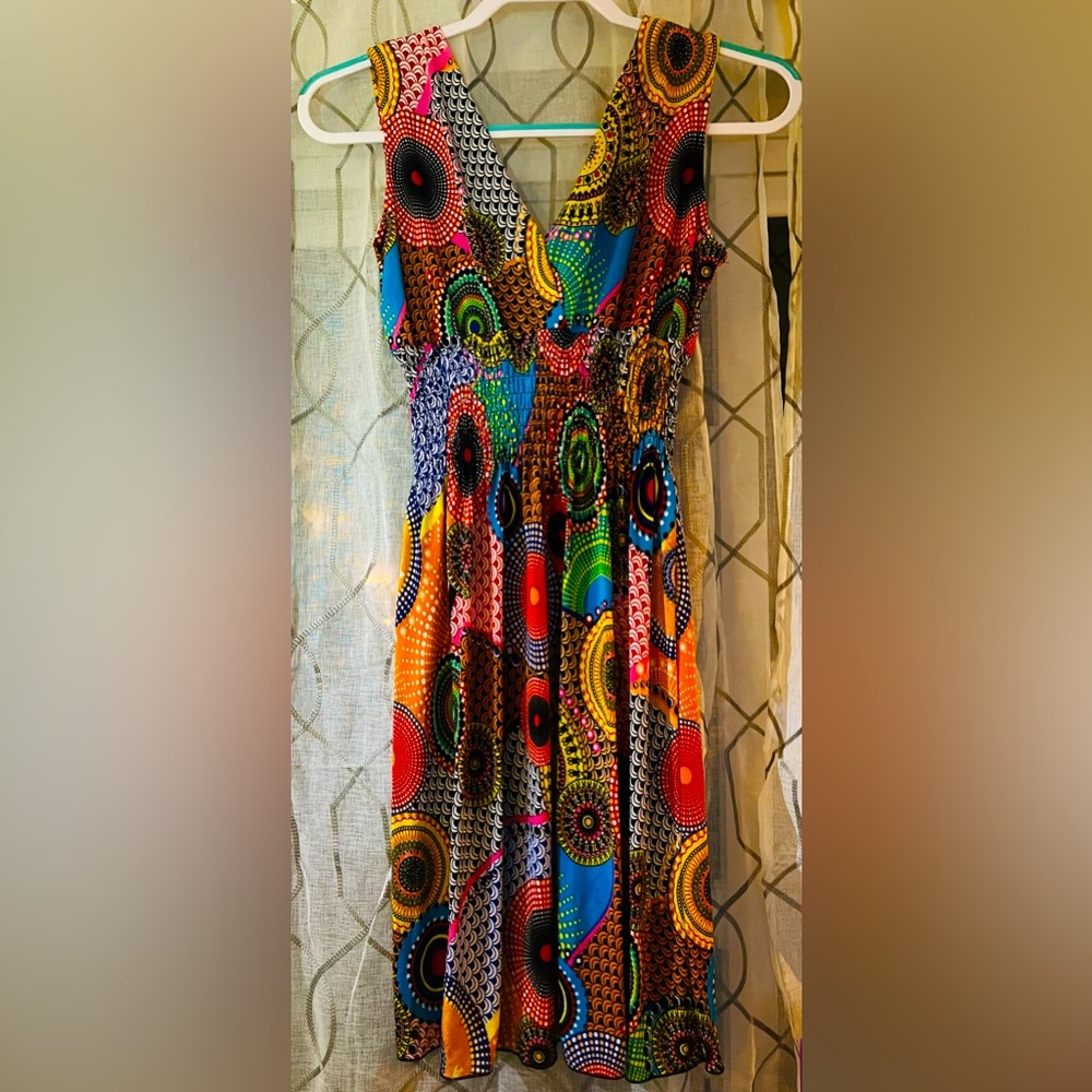 Beautiful, colorful dress; no tags (brand unknown). Super stretchy!